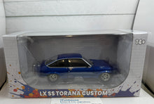 DDA Collectibles HOLDEN LX SS TORANA CUSTOM Sfragismeno Sealed Body Scale 1:24 BLUE